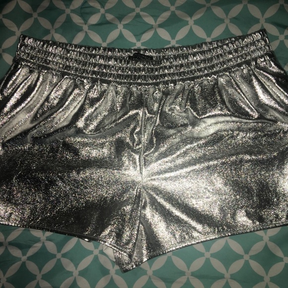 tight silver shorts